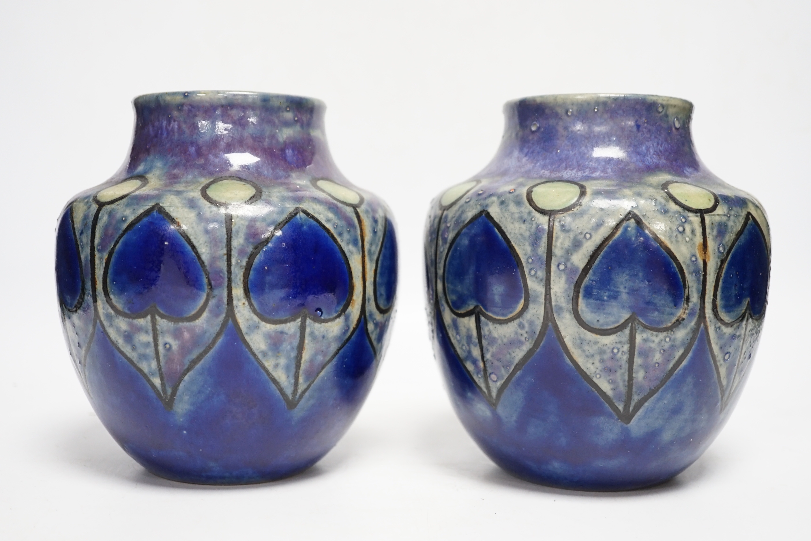 A pair of Royal Doulton stoneware vases, 16.5cm